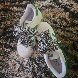 Adidas White and Green Sneakers with Bold Laces